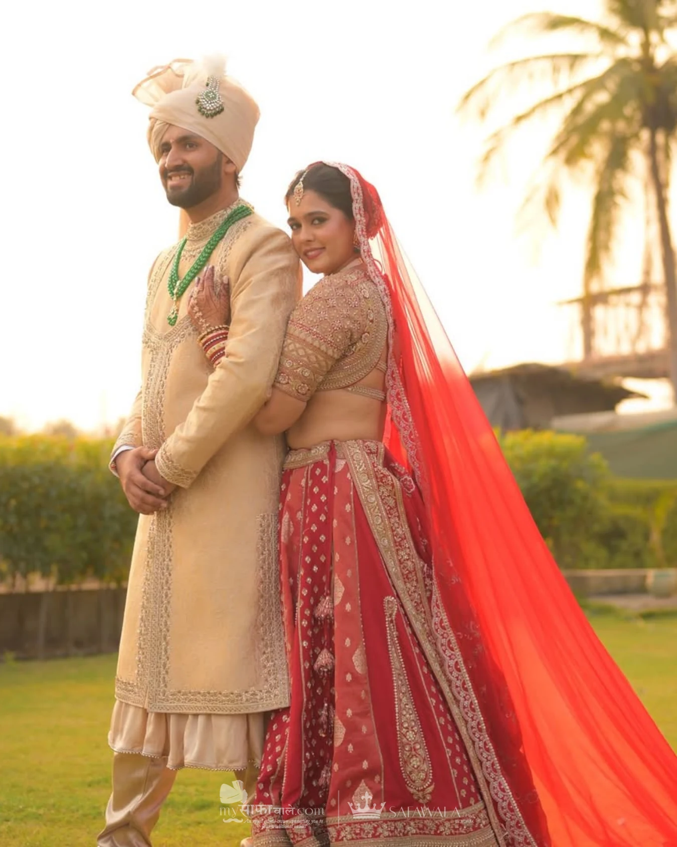 Classic groom pagdi styled with a red ceremonial stole for Dharavandhoo